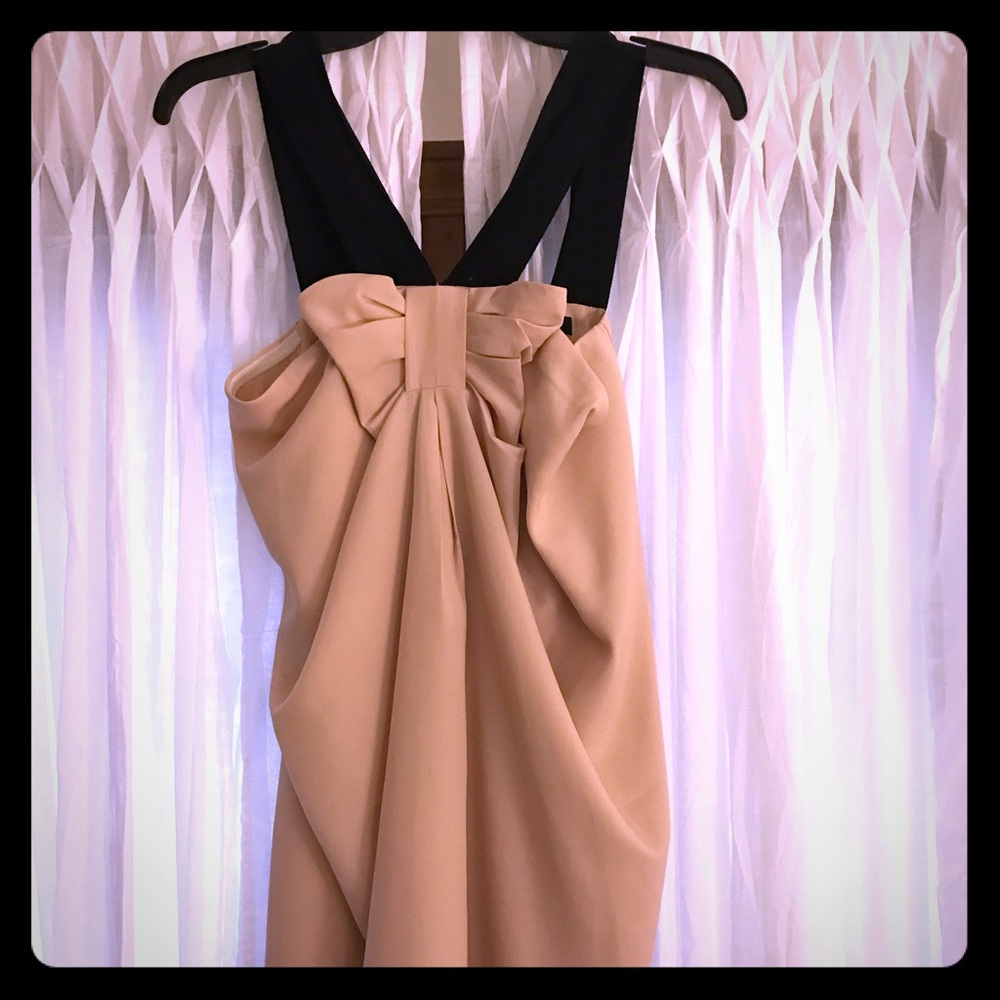 Nude dress with black bow